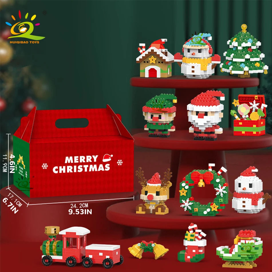 Christmas building block figures displayed on a shelf with gift box